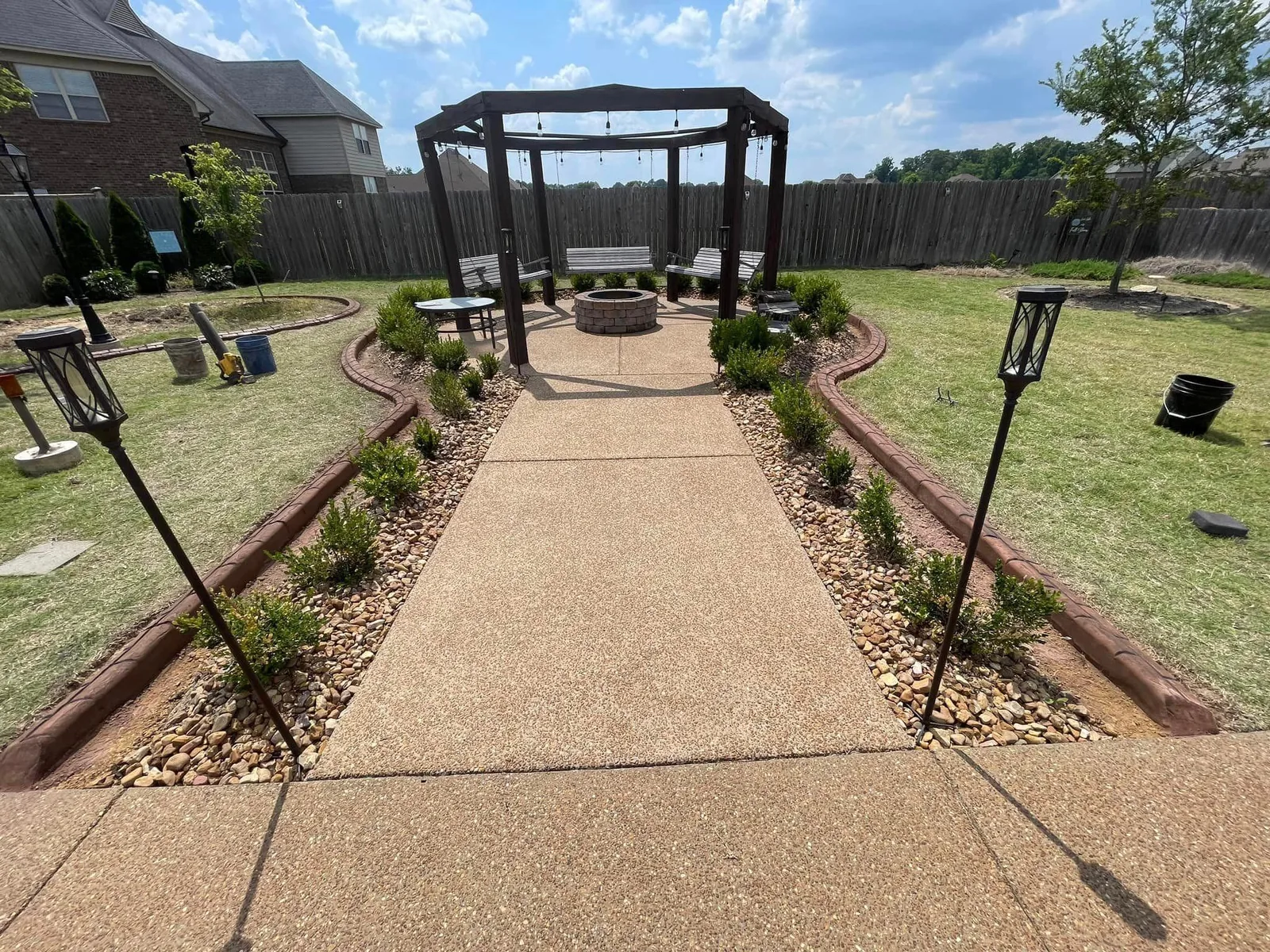 Decorative concrete curbing project photo with clean landscape border
